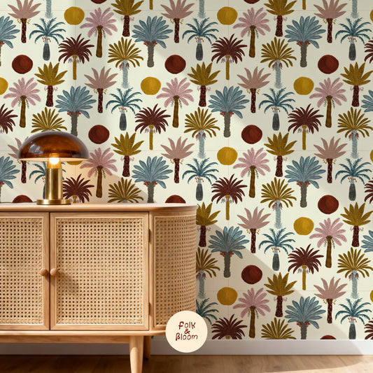 Palm Trees Wallpaper by Folk & Bloom with hand-drawn tropical palm trees in pink, blue and ochre tones for nurseries and children's bedrooms