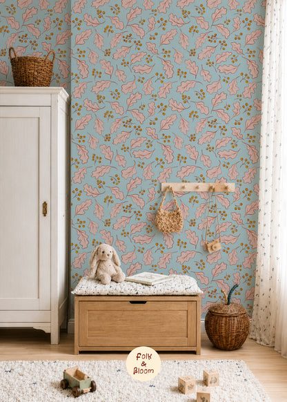 Blue nursery wallpaper with pink oak leaves by Folk & Bloom